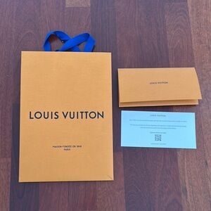 Louis Vuitton Orange Bag with Blue Handles